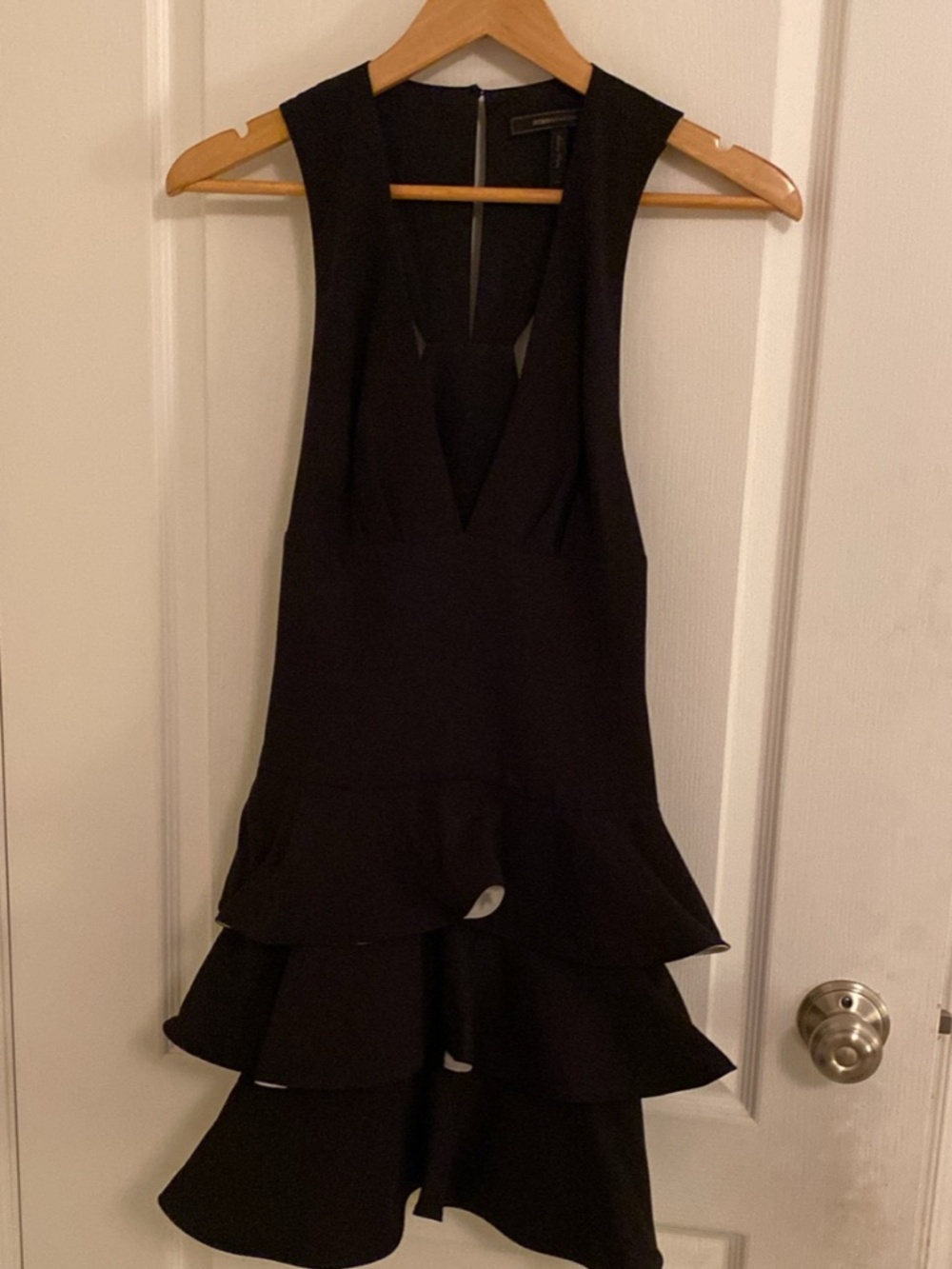 Black cocktail dress with ruffles